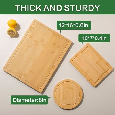 Set aus 3 Holz-Schnittbrettern mit Saft-Gräben Seitengriffe unterschiedliche Formen