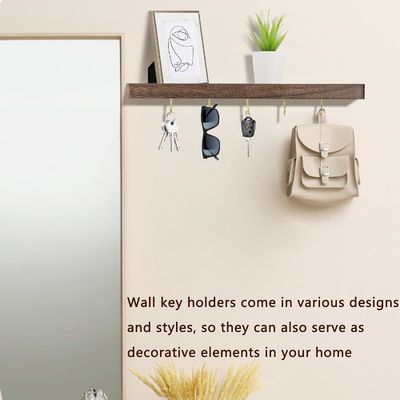 Einfach installierter Schlüsselhalter für die Wohnung Hängender Organisator mit vielen Haken