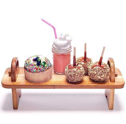 Moderne hochgehobene hölzerne Servierteller für Heimdekoration