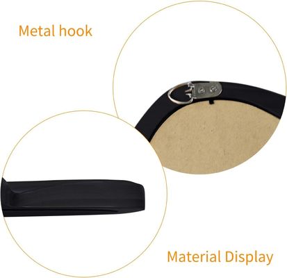 Schöne Wohnkultur Unregelmäßiger Wandspiegel mit schwarzem Holzrahmen und moderner Badezimmerdekoration