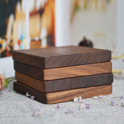 Benutzerdefiniertes Logo Akzeptable Walnuss-Kirschenholz-Coaster für umweltfreundlichen minimalistischen Design Stil